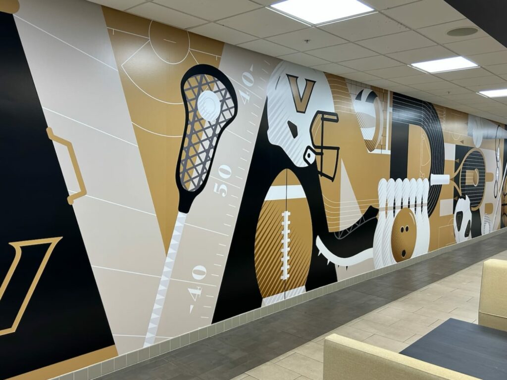 Vanderbilt University athletics mural illustration on wall in gym