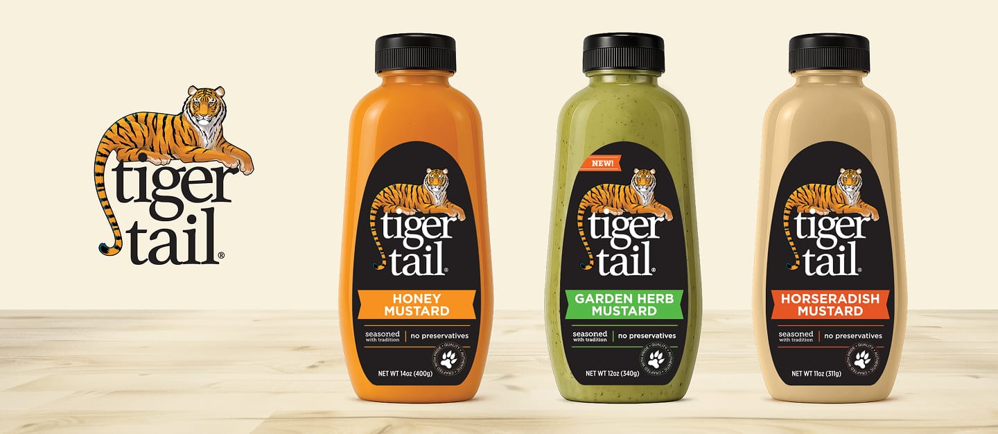 Tigertail Mustard bottles with illustrated tiger logo